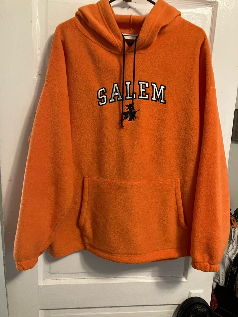 Like new ,  orange fleece hoodie. Sz L with SALEM detailing on front